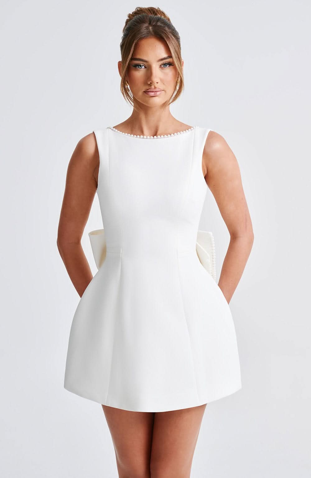 Pearl Trim Boat Neck Bow Back Pocket Fit and Flare Mini Dress