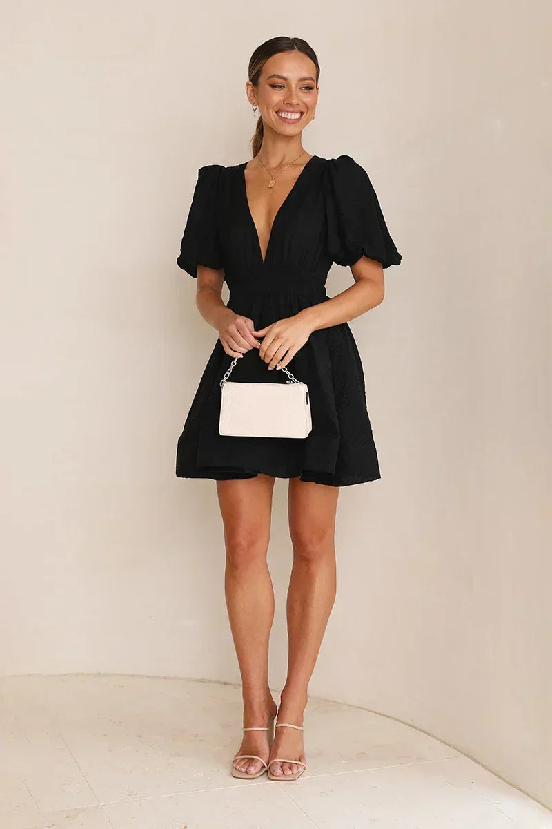 Deep V-Neck Puff Sleeve Smocked Waist Textured Fit and Flare Mini Dress