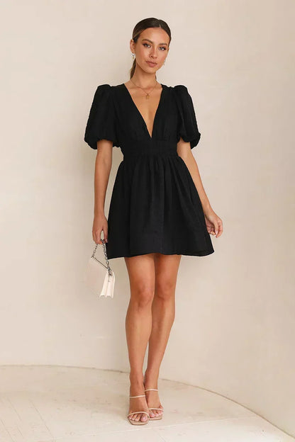 Deep V-Neck Puff Sleeve Smocked Waist Textured Fit and Flare Mini Dress