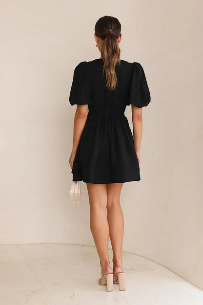 Deep V-Neck Puff Sleeve Smocked Waist Textured Fit and Flare Mini Dress