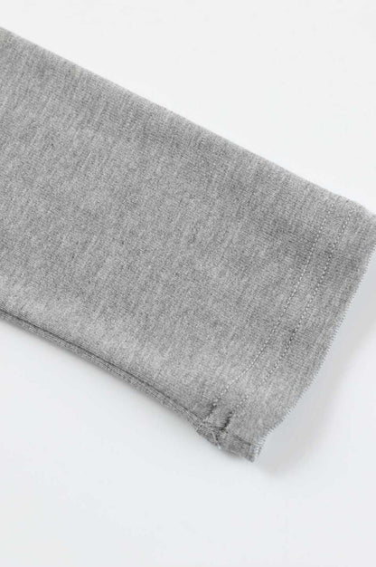 Contoured Long Sleeve Knit Top