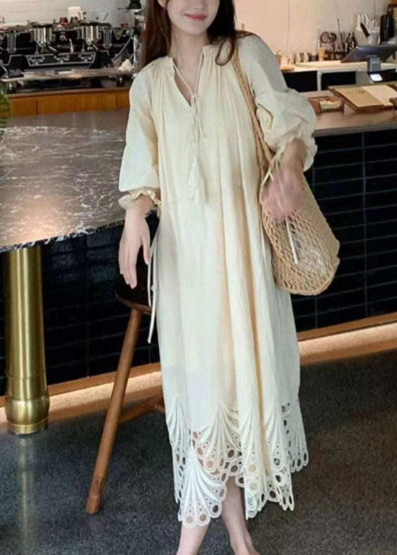 V-Neck Tassel Tie Three-Quarter Puff Sleeve Eyelet Embroidery Hem Midi Dress