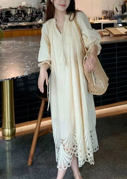 V-Neck Tassel Tie Three-Quarter Puff Sleeve Eyelet Embroidery Hem Midi Dress