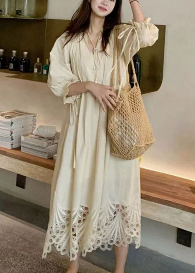 V-Neck Tassel Tie Three-Quarter Puff Sleeve Eyelet Embroidery Hem Midi Dress