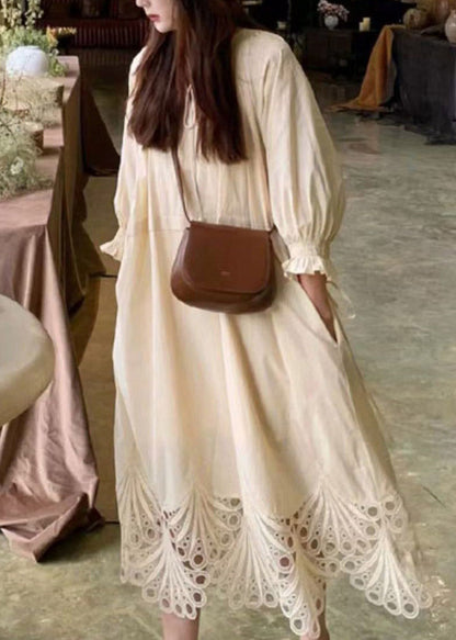 V-Neck Tassel Tie Three-Quarter Puff Sleeve Eyelet Embroidery Hem Midi Dress