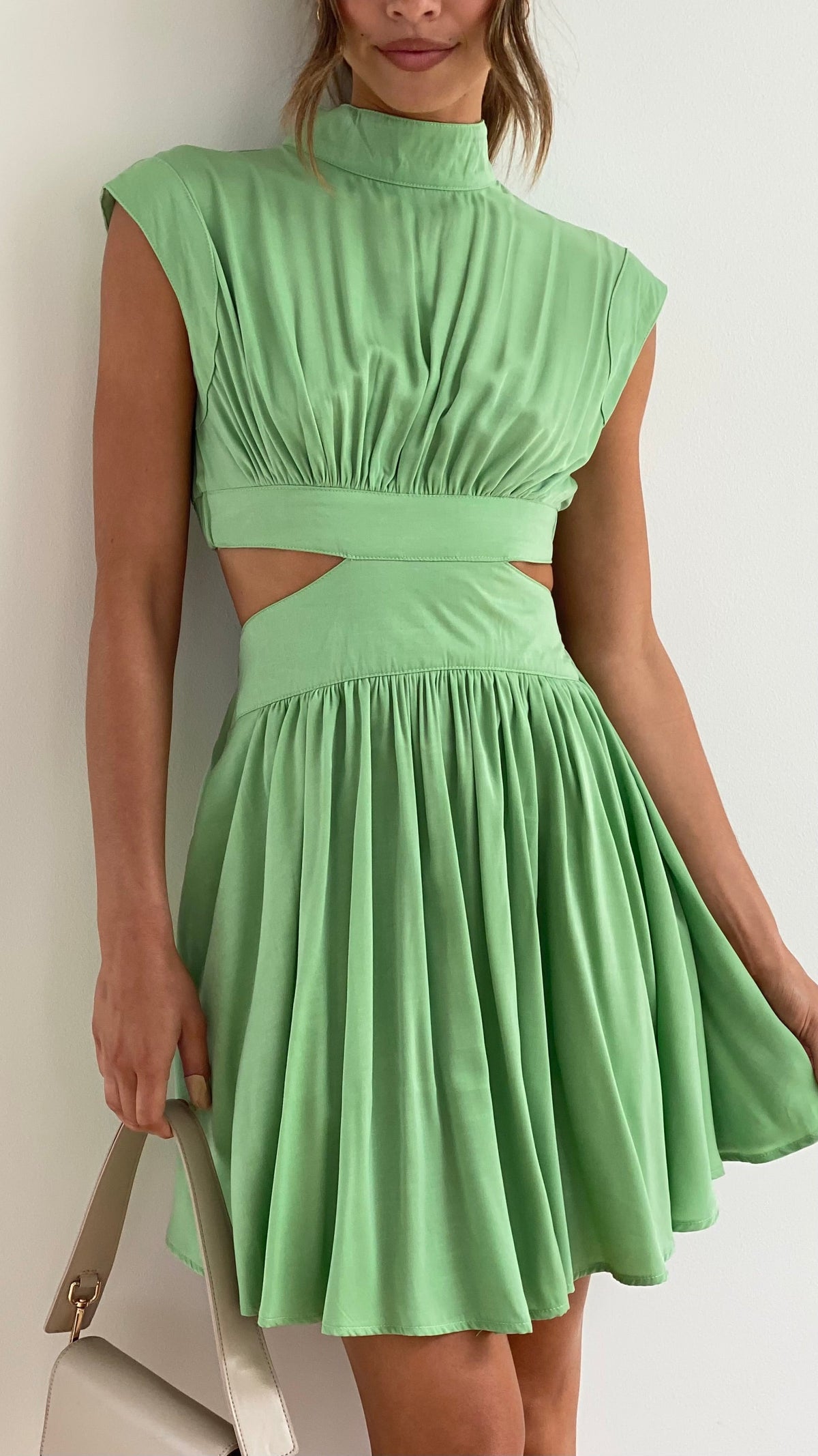 Mock Neck Structured Shoulder Waist Cutout Pleated Skater Mini Dress