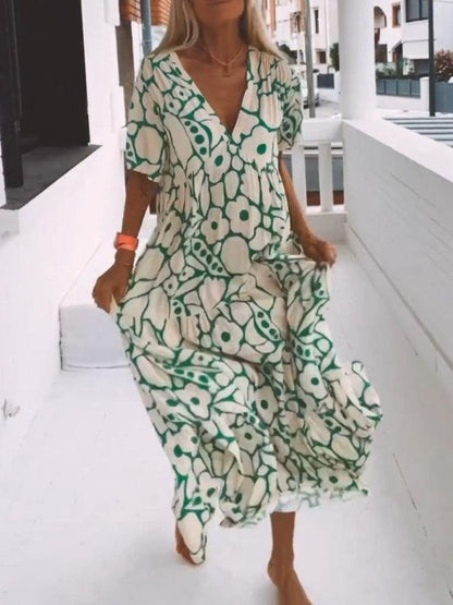 Deep V Neck Flutter Sleeve Tiered Botanical Print Maxi Dress