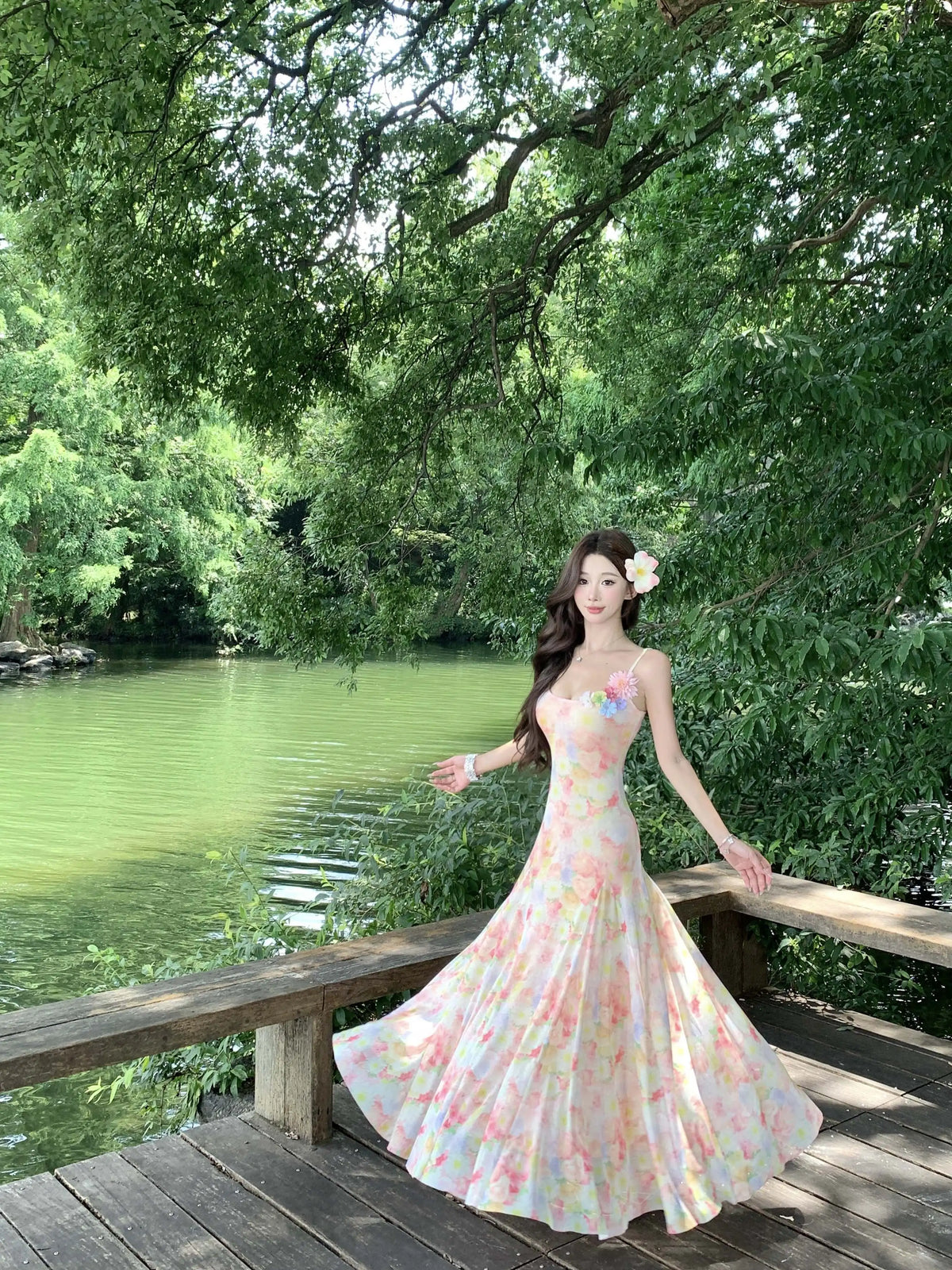 A stunning dress perfect for summer island photography, with a vacation style, sweet spaghetti straps, a fitted waist, suitable