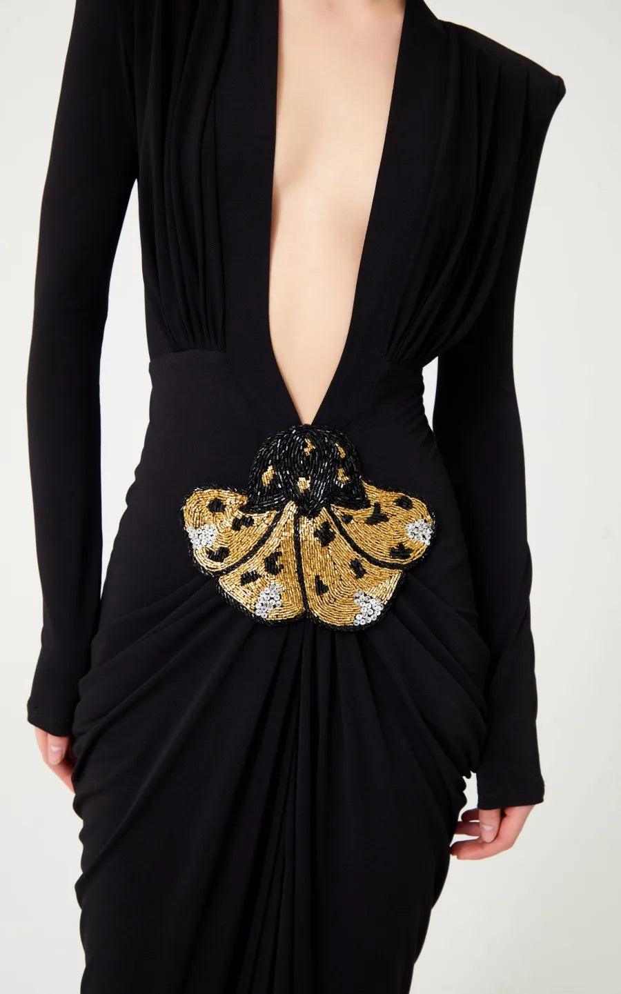 Deep V-Neck Padded Shoulder Butterfly Applique Draped Maxi Gown