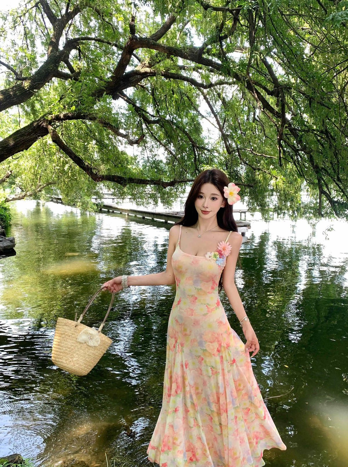 A stunning dress perfect for summer island photography, with a vacation style, sweet spaghetti straps, a fitted waist, suitable