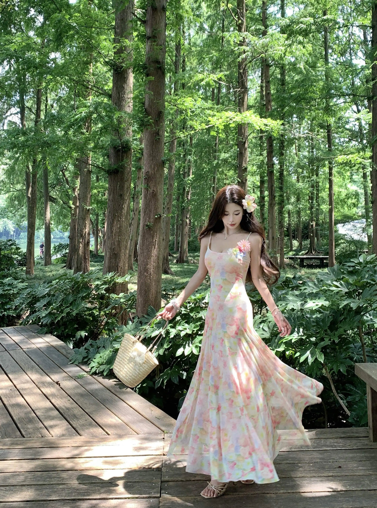 A stunning dress perfect for summer island photography, with a vacation style, sweet spaghetti straps, a fitted waist, suitable