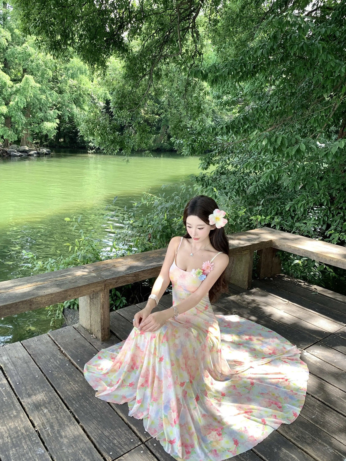 A stunning dress perfect for summer island photography, with a vacation style, sweet spaghetti straps, a fitted waist, suitable