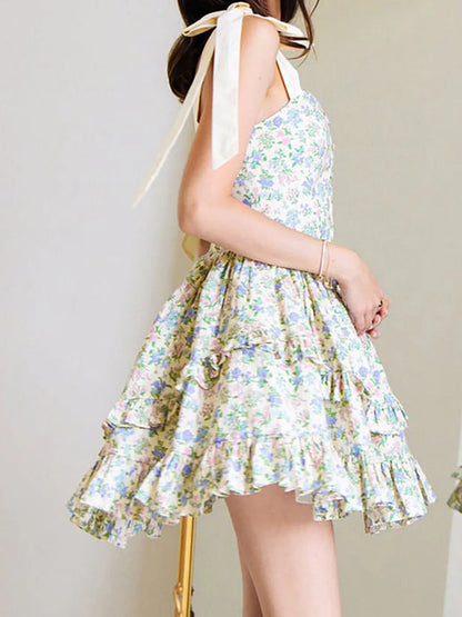 Elegant Sleeveless Floral Print Mini Dress with Bow Tie Shoulder Detail and Flirty Ruffle Hem - A Line Swing Dress for Women