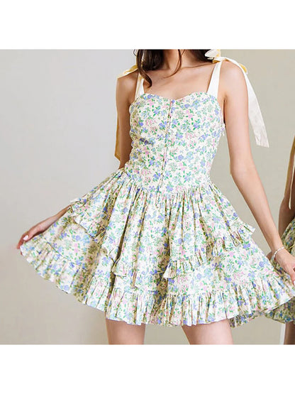 Elegant Sleeveless Floral Print Mini Dress with Bow Tie Shoulder Detail and Flirty Ruffle Hem - A Line Swing Dress for Women