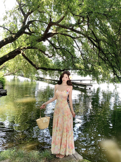 A stunning dress perfect for summer island photography, with a vacation style, sweet spaghetti straps, a fitted waist, suitable