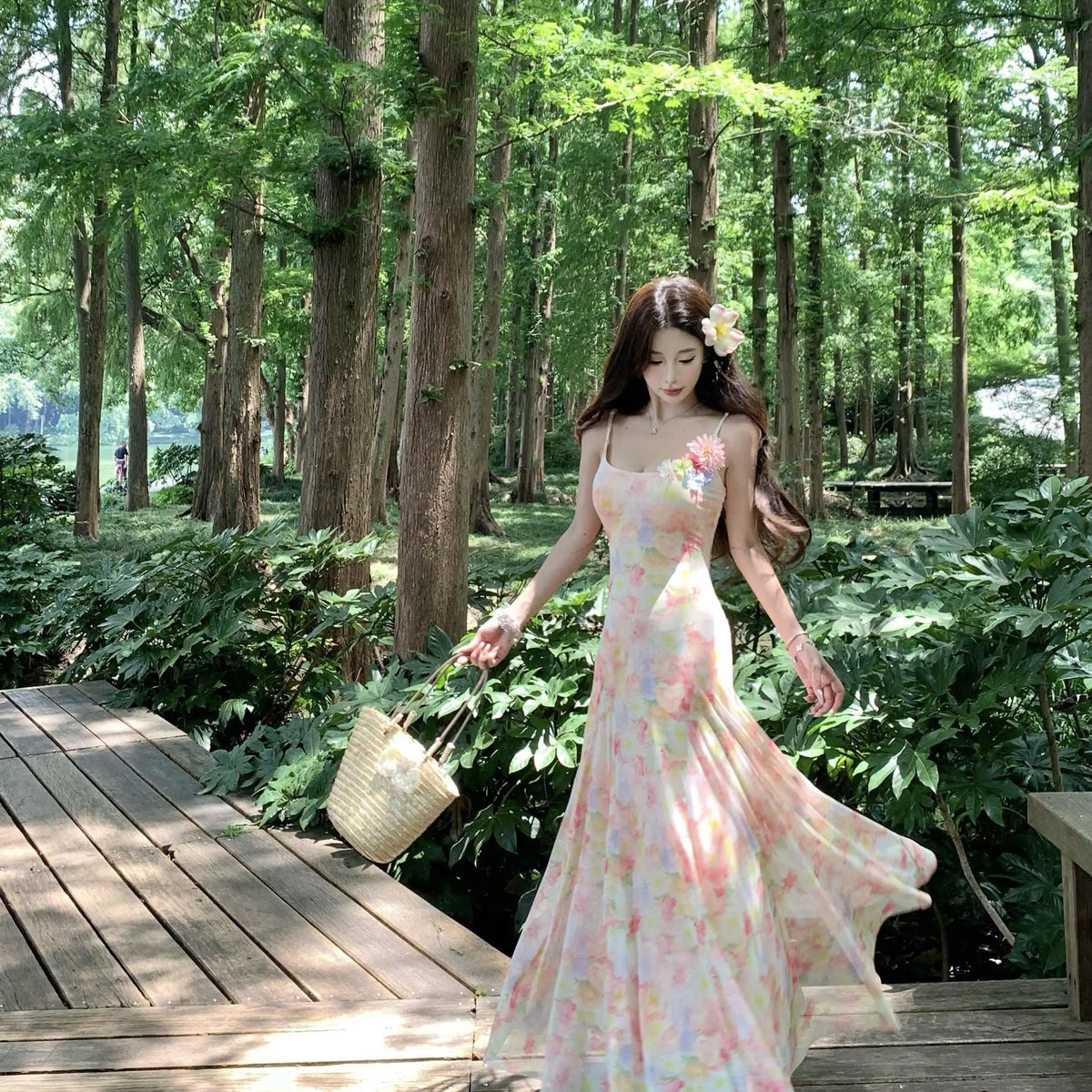 A stunning dress perfect for summer island photography, with a vacation style, sweet spaghetti straps, a fitted waist, suitable