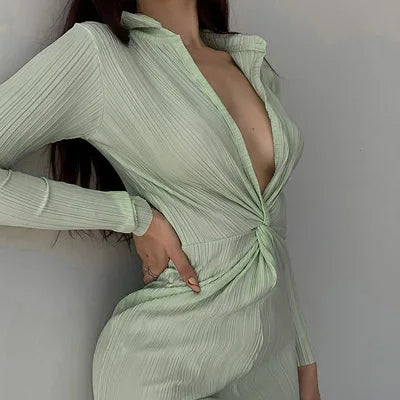 Plisse Collared Deep V-Neck Twist Waist Long Sleeve Jumpsuit