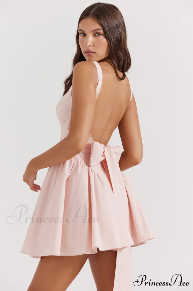 Floriane Peach Stylish Bow Mini Dress