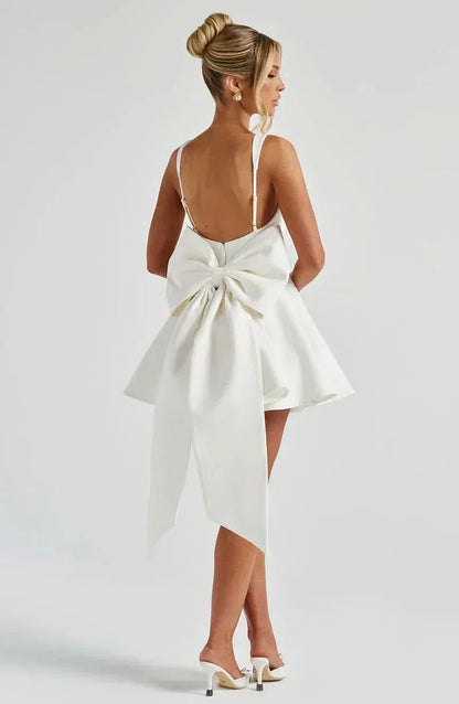 Square Neck Box Pleat Back Oversized Bow Tail Mini Dress