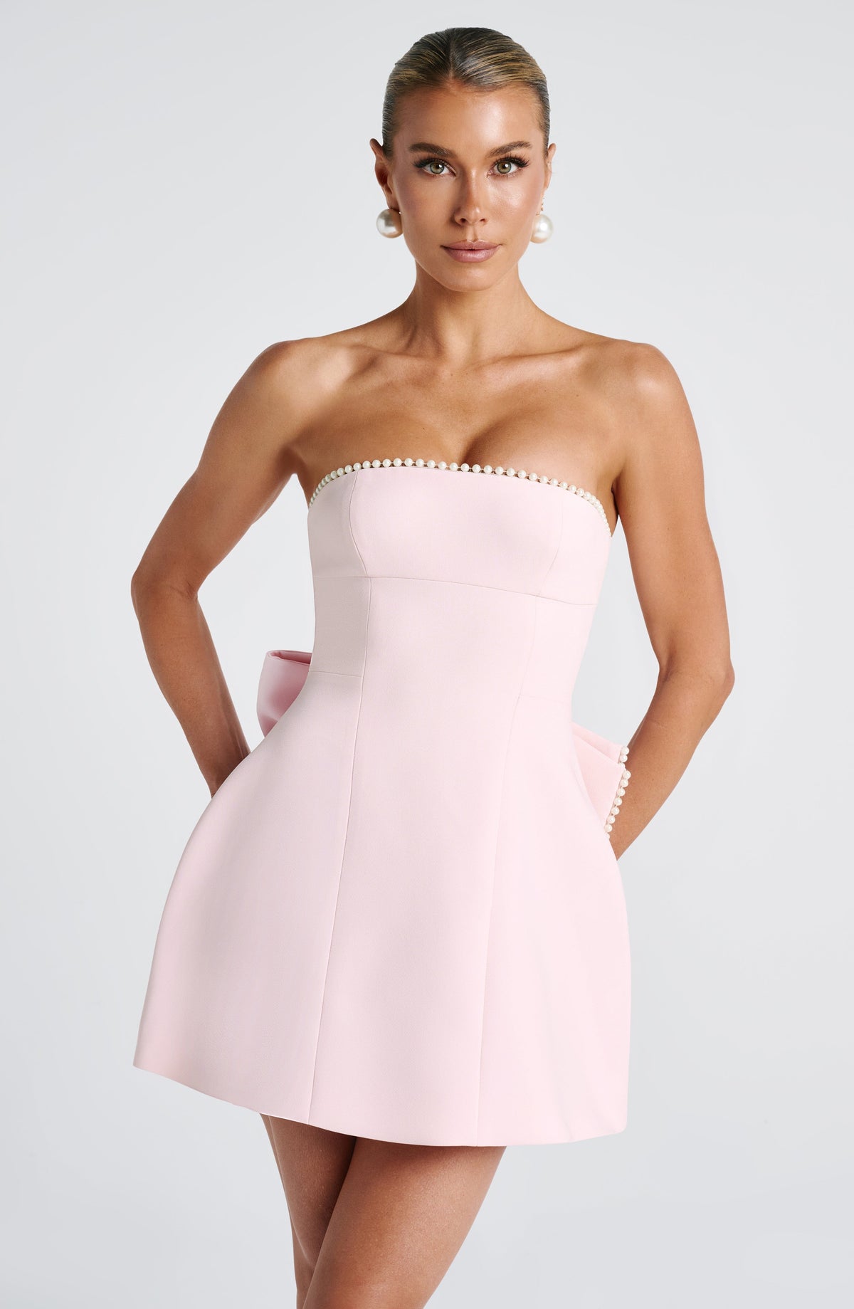 Pearl Trim Strapless Paneled Bow Back A-Line Mini Dress