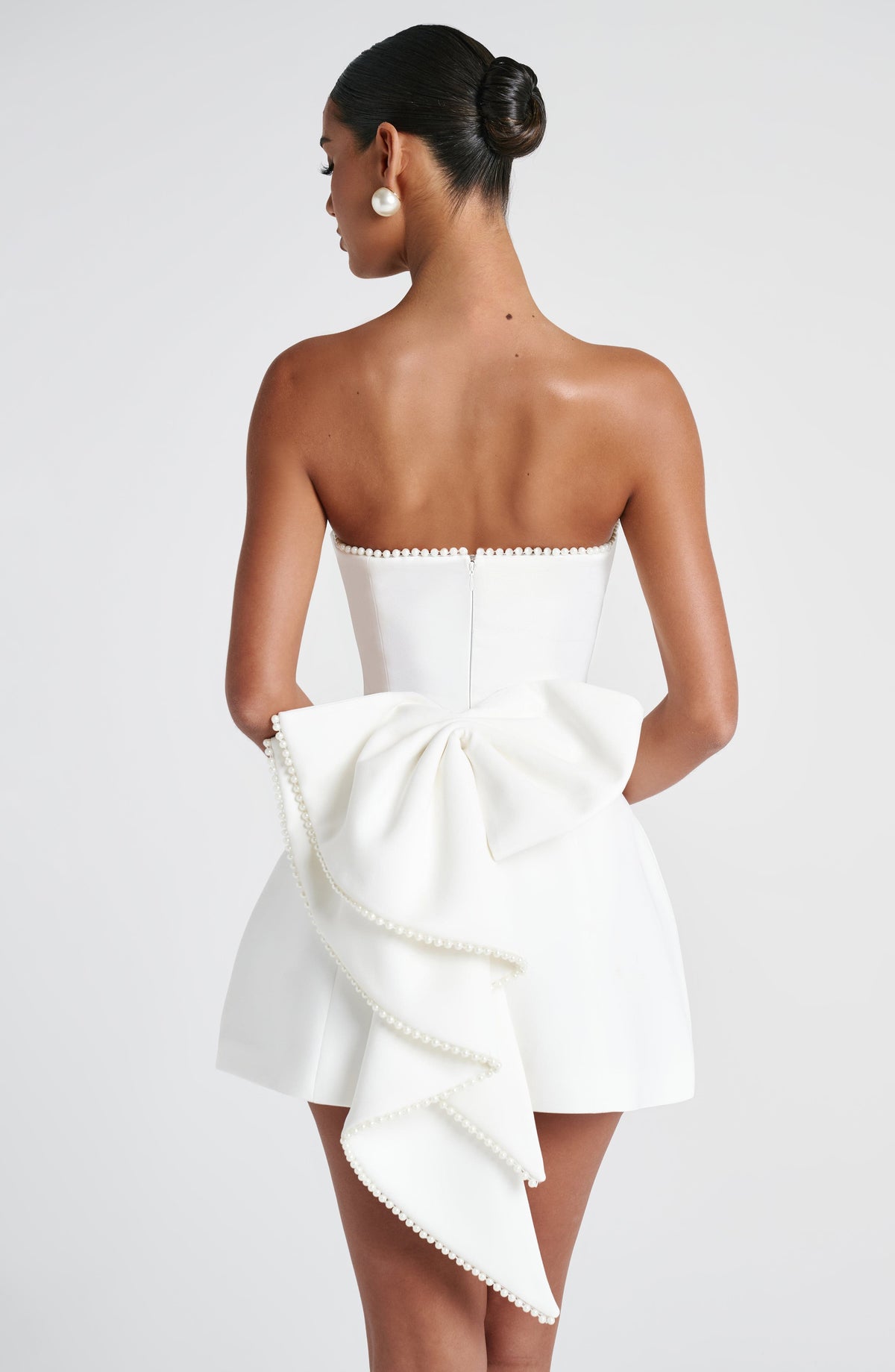 Pearl Trim Strapless Paneled Bow Back A-Line Mini Dress